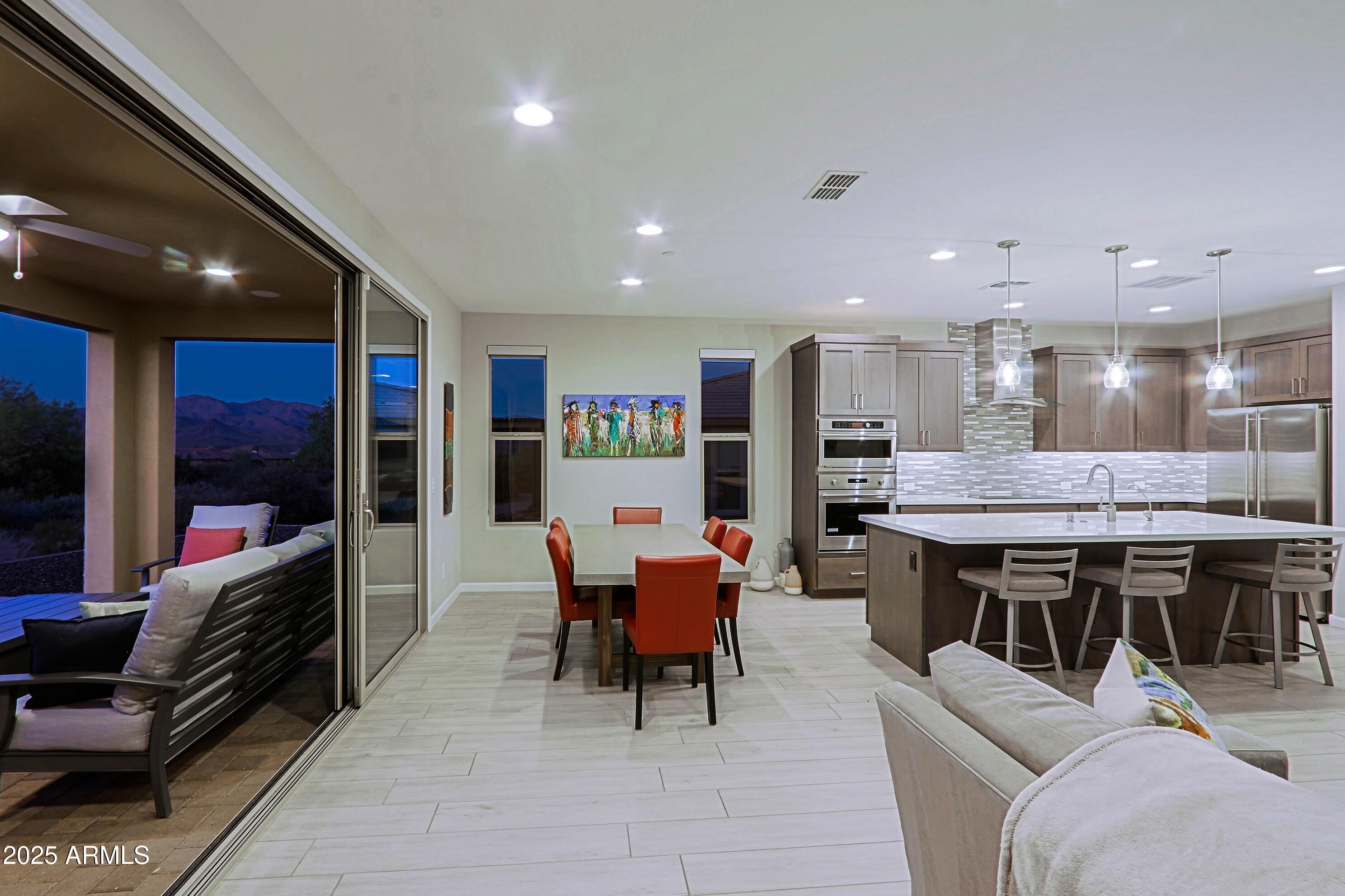 17668 East Chevelon Canyon Circle Rio Verde, AZ 85263 - Photo 21 of 59 a living room with stainless steel appliances furniture and a kitchen view