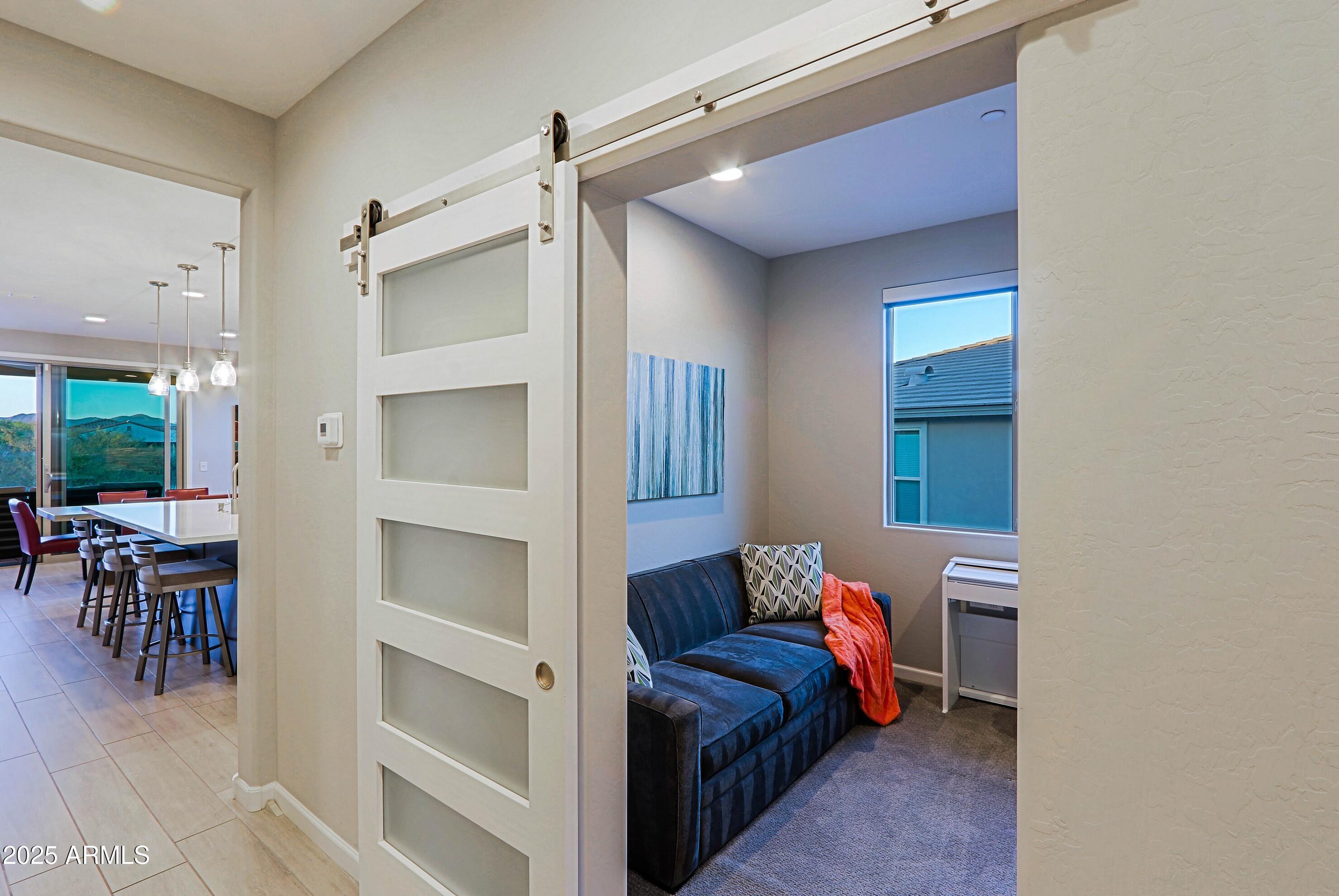 17668 East Chevelon Canyon Circle Rio Verde, AZ 85263 - Photo 30 of 59 a living room with furniture and a window