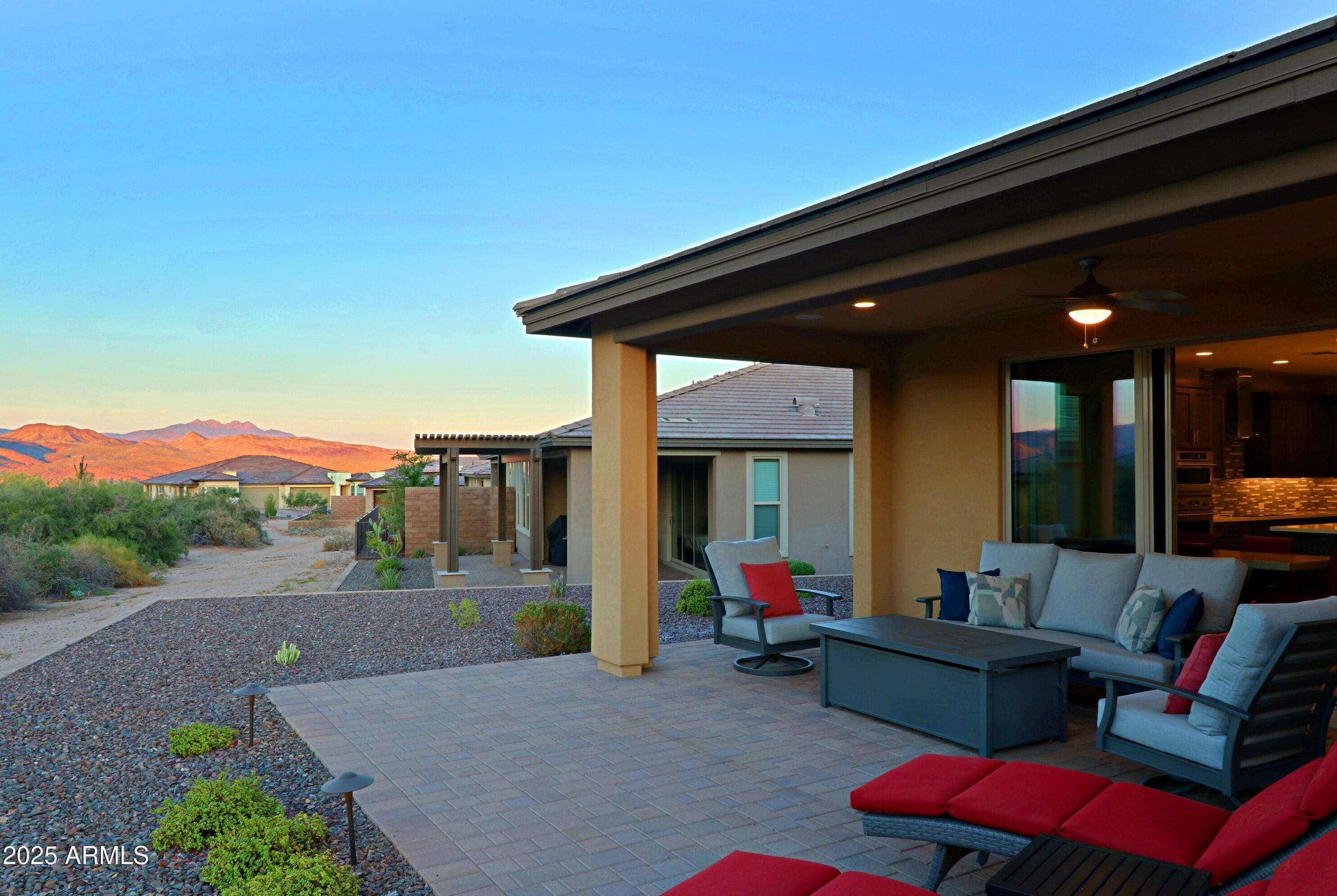17668 East Chevelon Canyon Circle Rio Verde, AZ 85263 - Photo 38 of 59 a outdoor living space with furniture and a potted plant