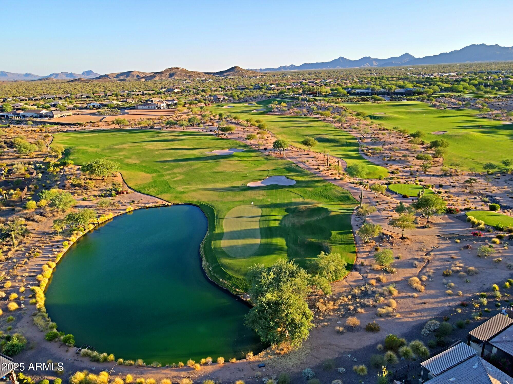 17668 East Chevelon Canyon Circle Rio Verde, AZ 85263 - Photo 44 of 59 a view of a lake with a mountain