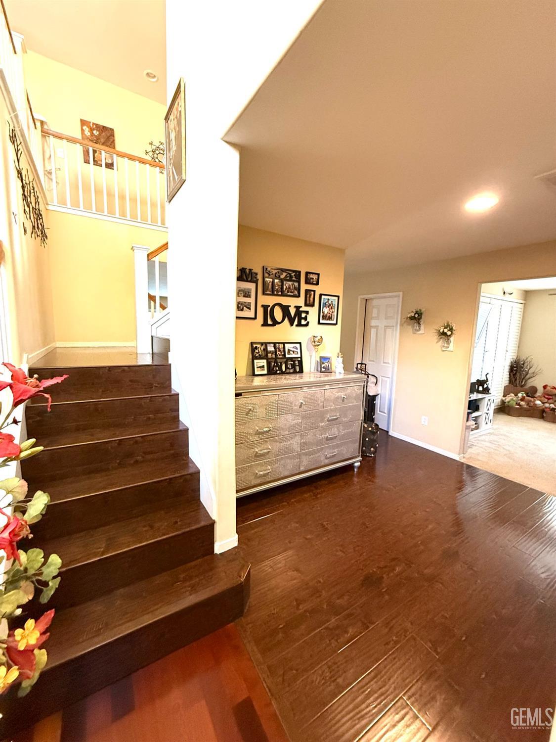 Undisclosed Address Bakersfield, CA 93311 - Photo 13 of 52 a view of a bedroom with furniture and windows
