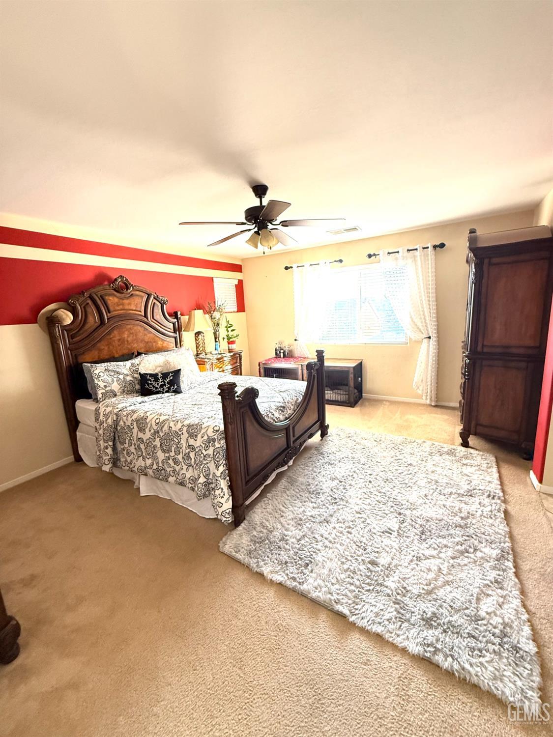 Undisclosed Address Bakersfield, CA 93311 - Photo 28 of 52 a living room with furniture rug and a fireplace