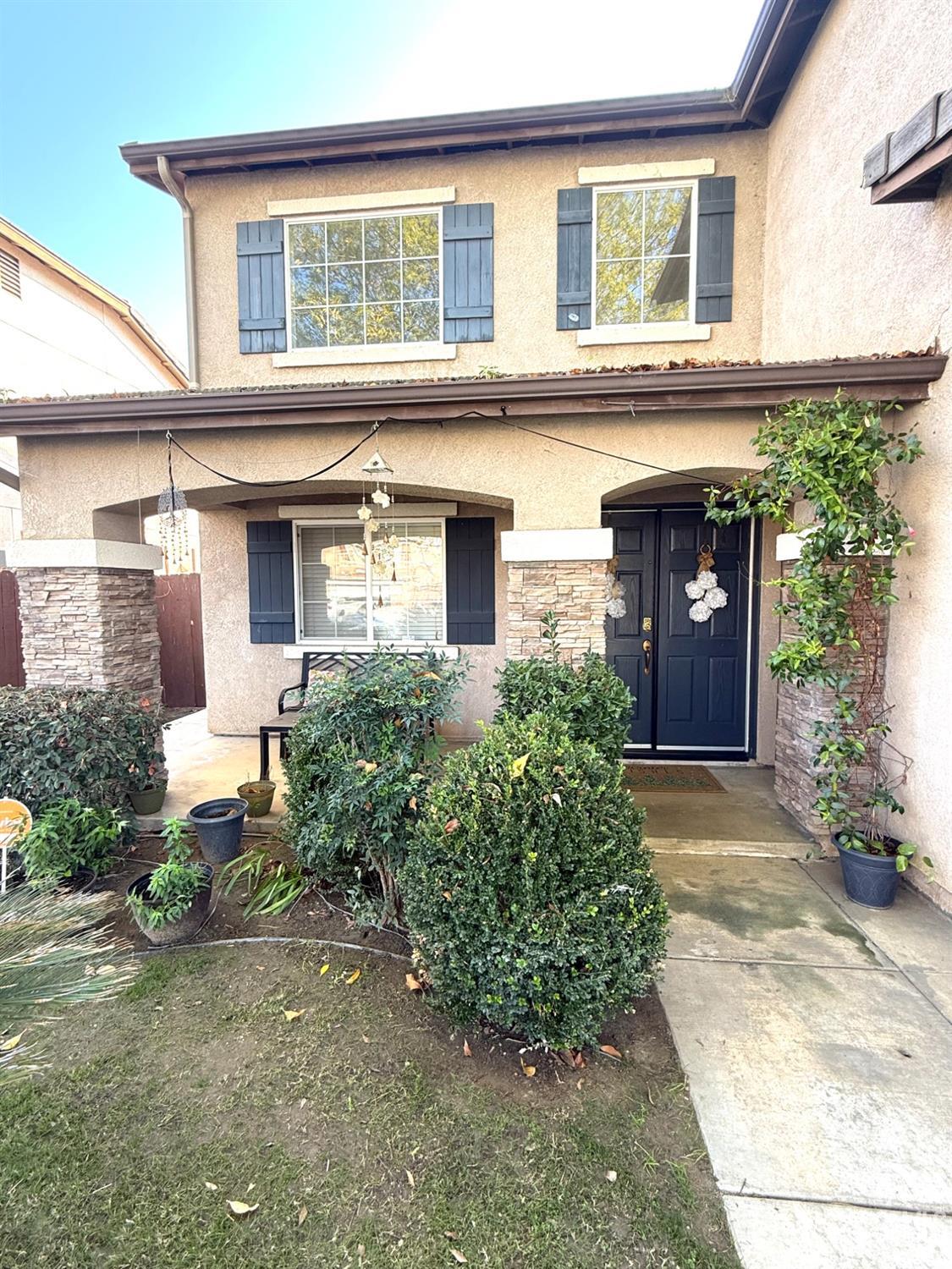 Undisclosed Address Bakersfield, CA 93311 - Photo 4 of 52 front view of a house