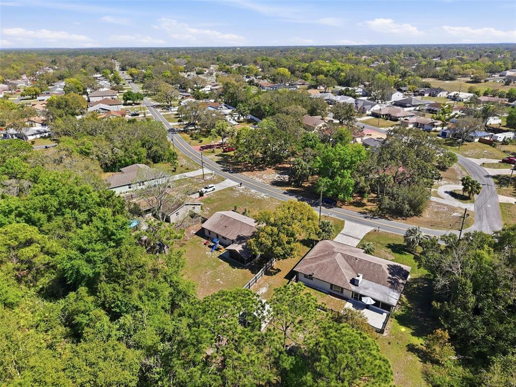 5485 Pinehurst Drive Spring Hill, FL 34606 - Photo 44 of 45 an aerial view of multiple house