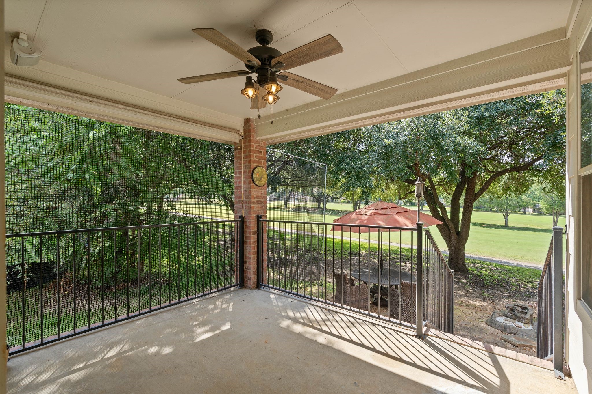 166 April Cove Montgomery, TX 77356 - Photo 30 of 37 Covered back patio providing a shaded outdoor retreat for relaxing or dining al fresco.