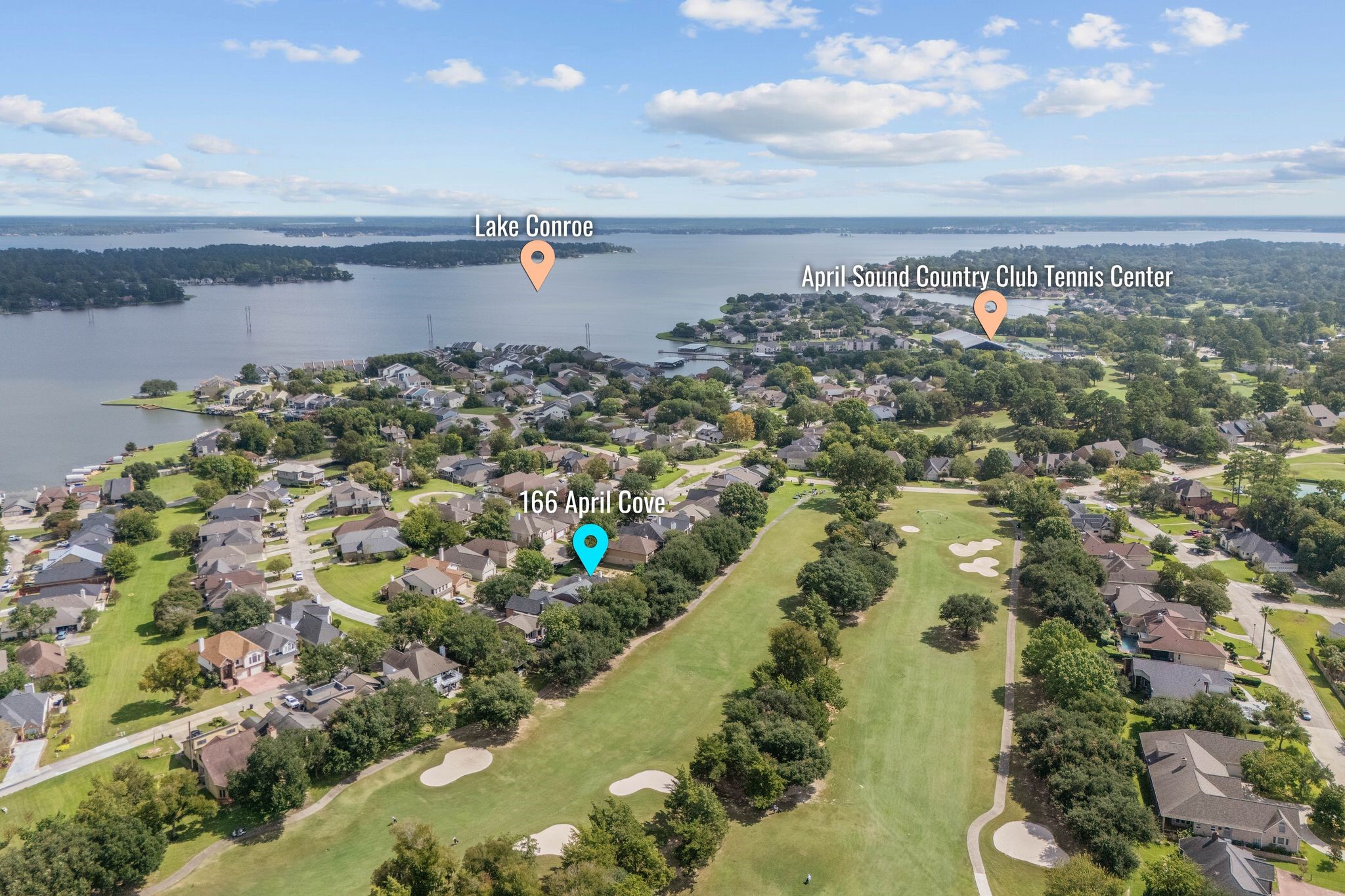 166 April Cove Montgomery, TX 77356 - Photo 36 of 37 Bird’s-eye views highlighting proximity to Lake Conroe, community amenities, and surrounding green space.