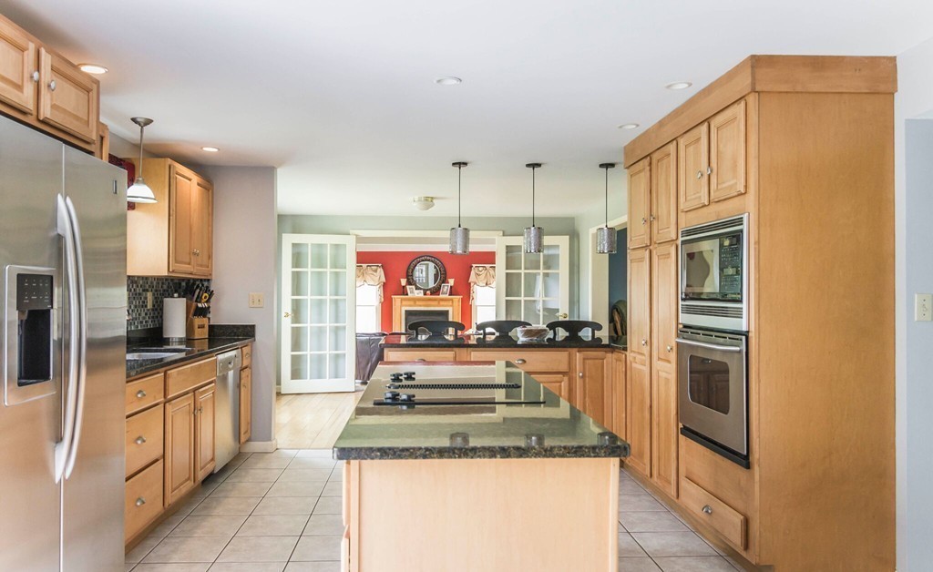 247 Town Farm Road Warren, MA 01083 - Photo 3 of 28 a kitchen with stainless steel appliances granite countertop a stove and a refrigerator