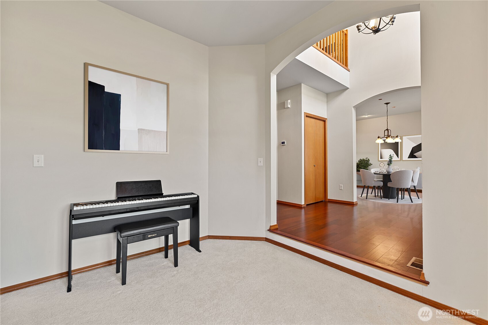 9301 53rd Avenue South Seattle, WA 98118 - Photo 22 of 25 a view of a livingroom with furniture and a flat screen tv