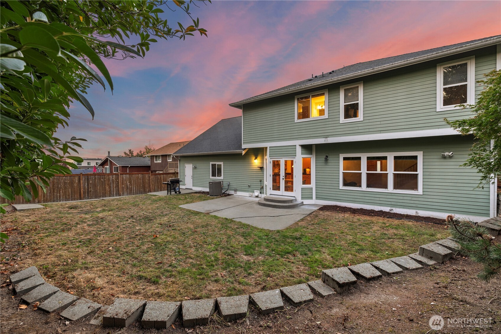 9301 53rd Avenue South Seattle, WA 98118 - Photo 23 of 25 a front view of a house with garden