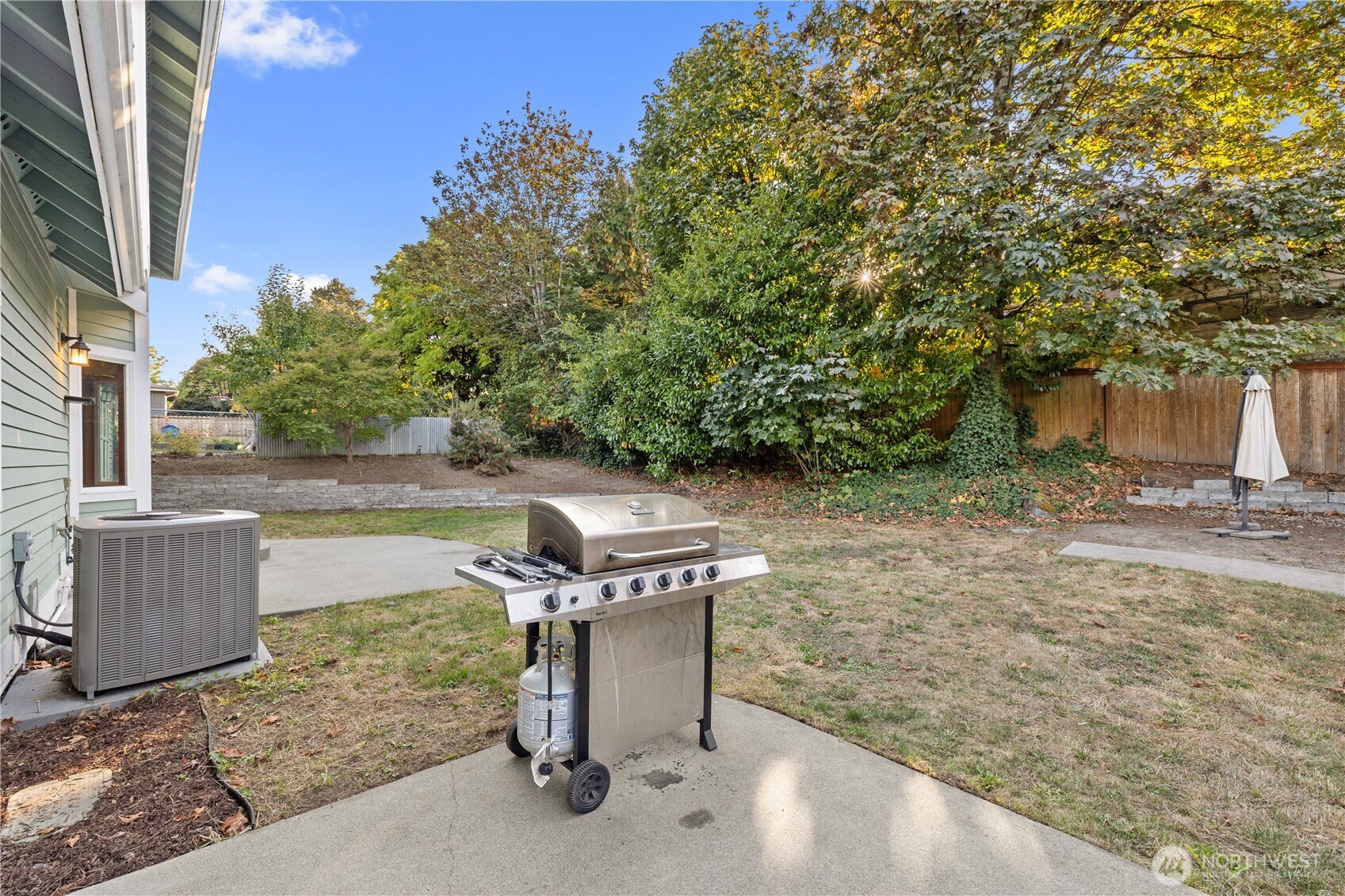 9301 53rd Avenue South Seattle, WA 98118 - Photo 24 of 25 a view of a house with a yard