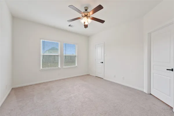 a front view of a house with a garage