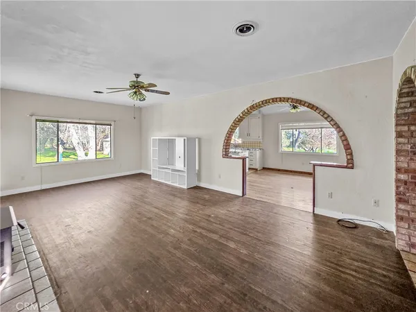 a view of a livingroom with wooden floor