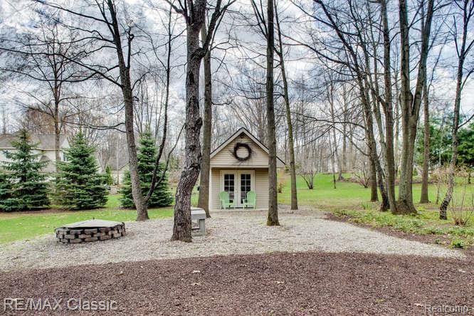 2165 Moorlands Howell, MI 48855 - Photo 9 of 36 Spend Evenings Around the Fire Pit