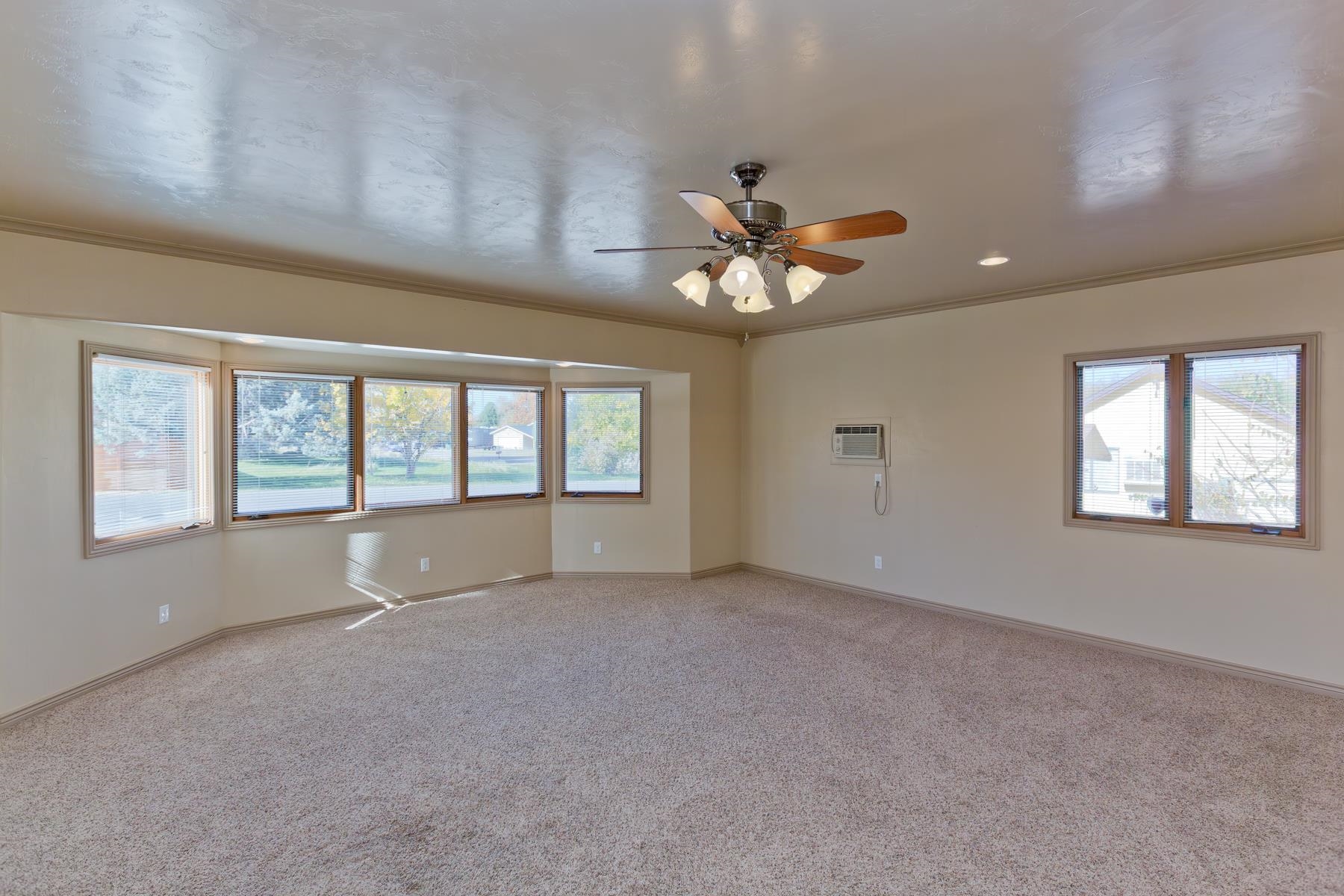 431 Pleasant Ridge Lane, Unit A Grand Junction, CO 81507 - Photo 14 of 29 a view of an empty room with a window
