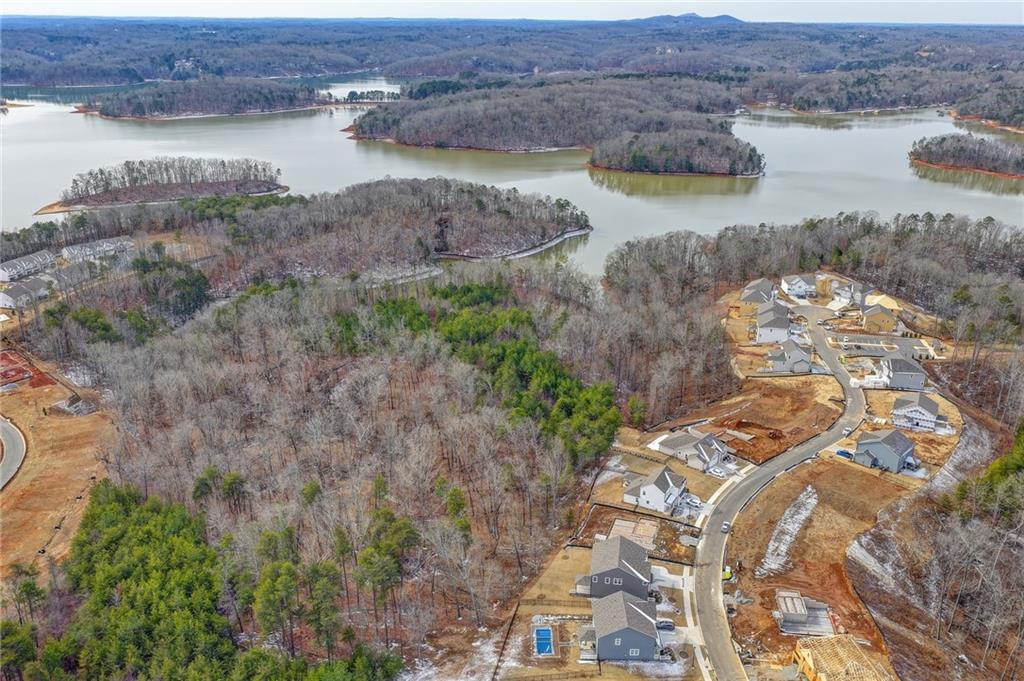 4067 Peregrine Way Gainesville, GA 30506 - Photo 34 of 52 an aerial view of residential houses with outdoor space and river