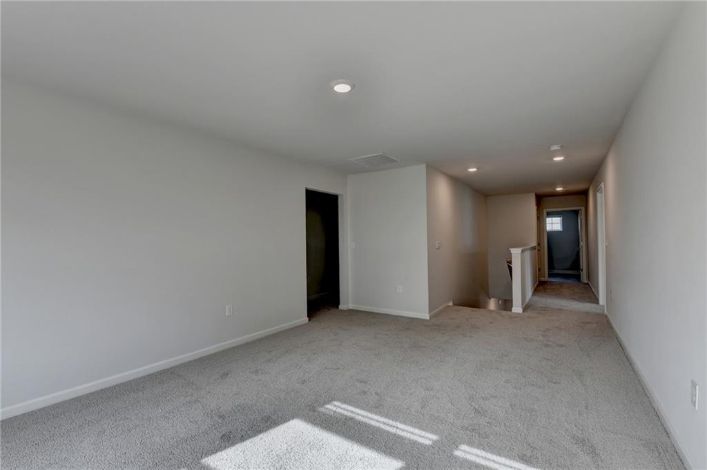 4067 Peregrine Way Gainesville, GA 30506 - Photo 46 of 52 a view of empty room