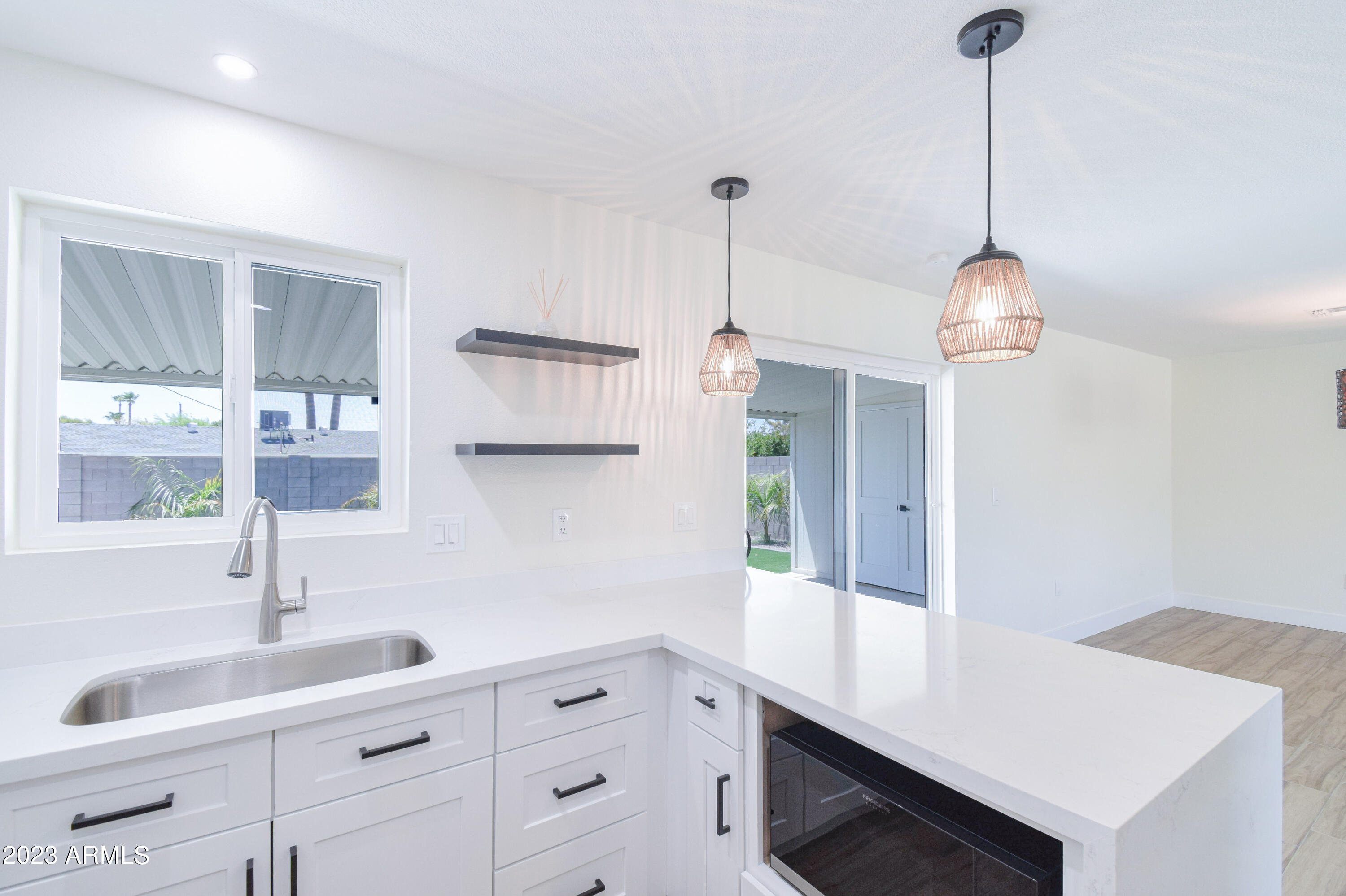 401 East Fillmore Street Tempe, AZ 85288 - Photo 7 of 32 Stainless Steel Sink & Pendant Lighting