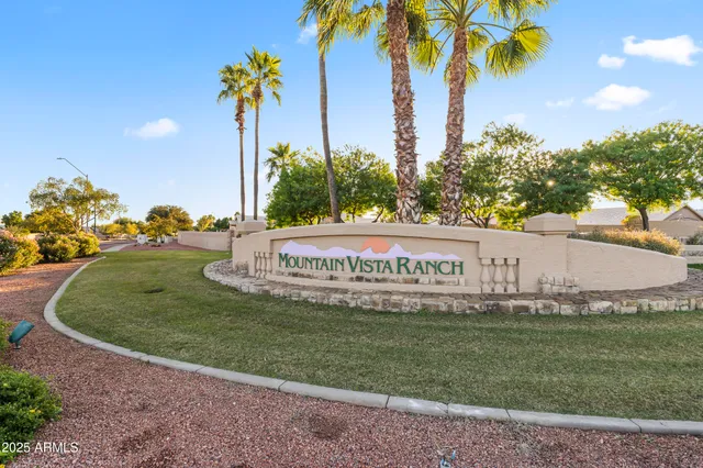 a sign on the side of the road