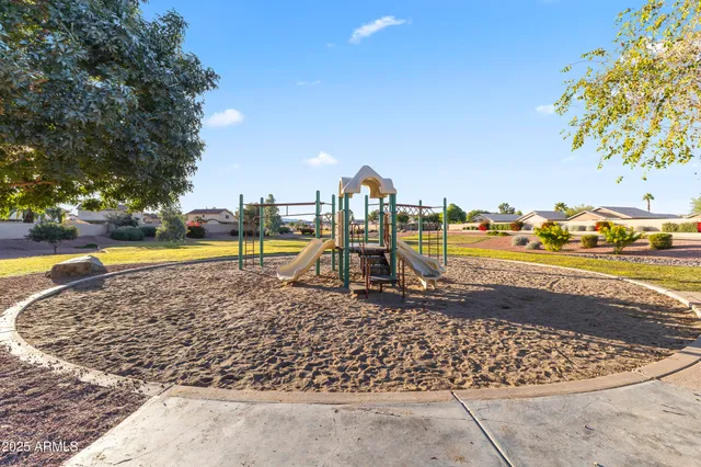 a view of a swimming pool with an ocean view