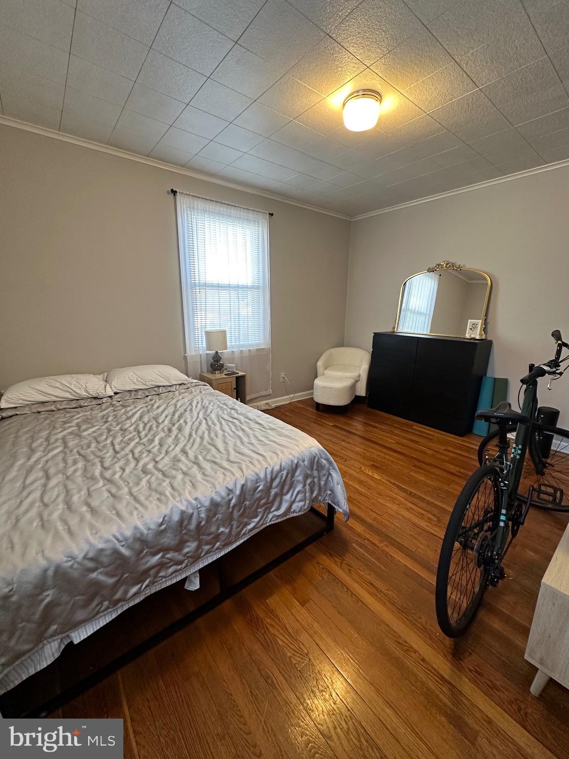 221 West Chester Pike, Unit B Ridley Park, PA 19078 - Photo 11 of 18 a bedroom with a bed and a window
