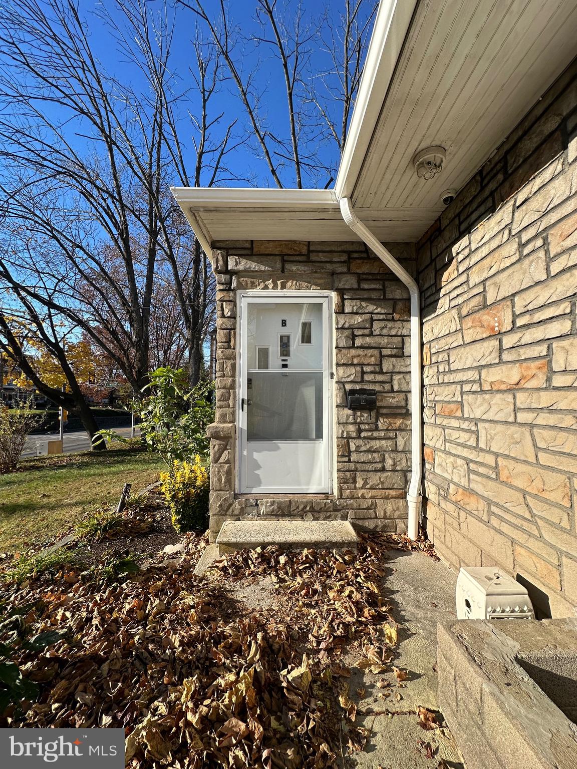 221 West Chester Pike, Unit B Ridley Park, PA 19078 - Photo 13 of 18 a front view of a house with a yard