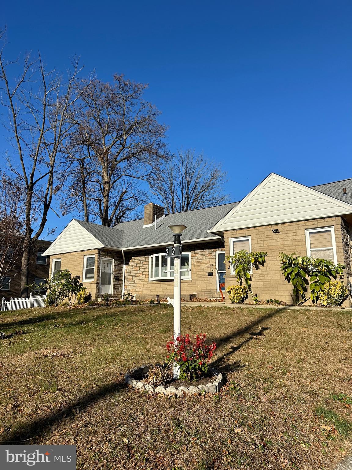 221 West Chester Pike, Unit B Ridley Park, PA 19078 - Photo 14 of 18 a front view of a house with garden