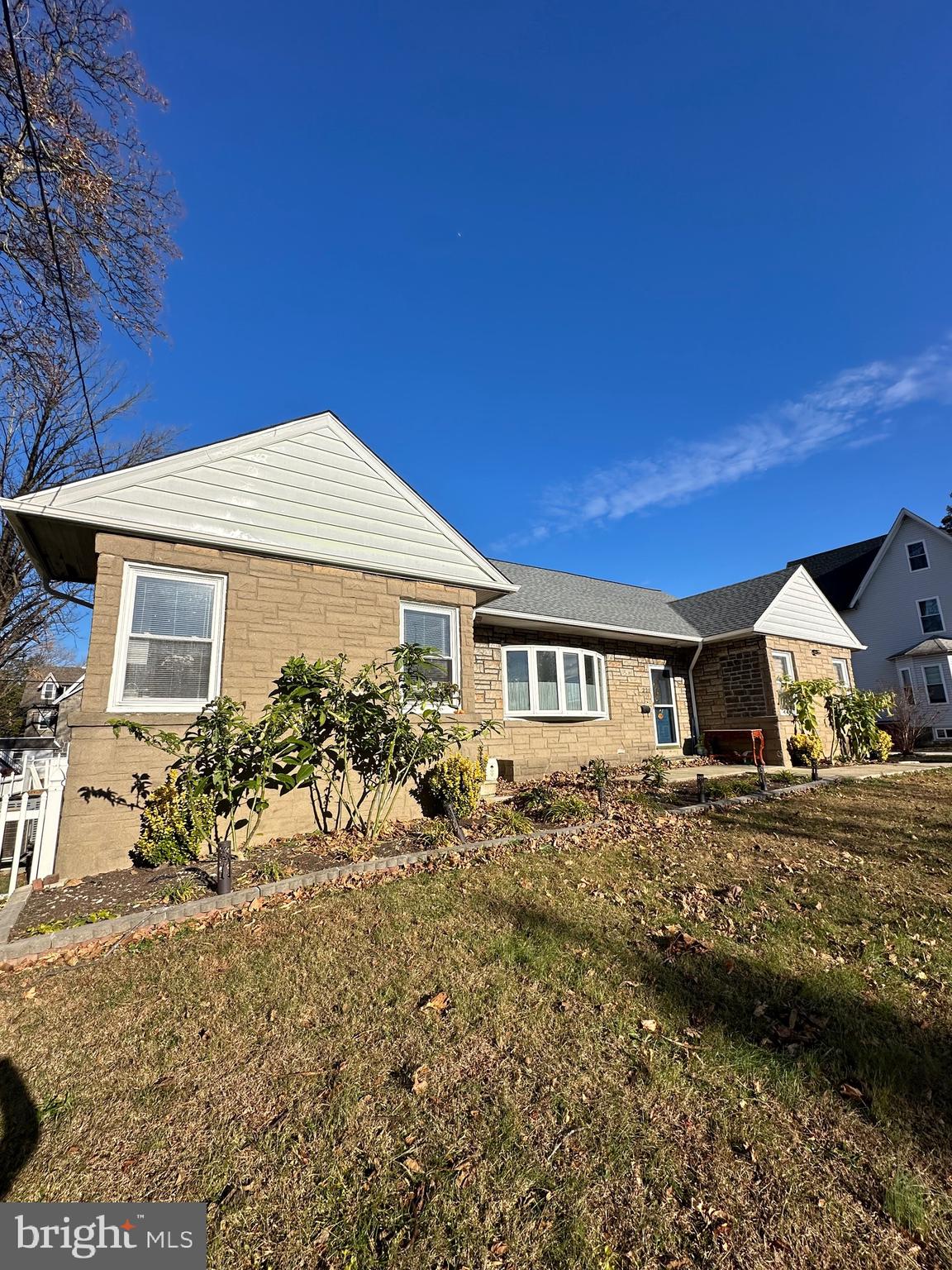 221 West Chester Pike, Unit B Ridley Park, PA 19078 - Photo 17 of 18 a view of a house with a yard