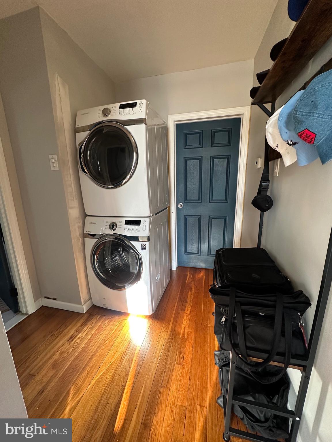 221 West Chester Pike, Unit B Ridley Park, PA 19078 - Photo 9 of 18 a bedroom with a bed and washing machine