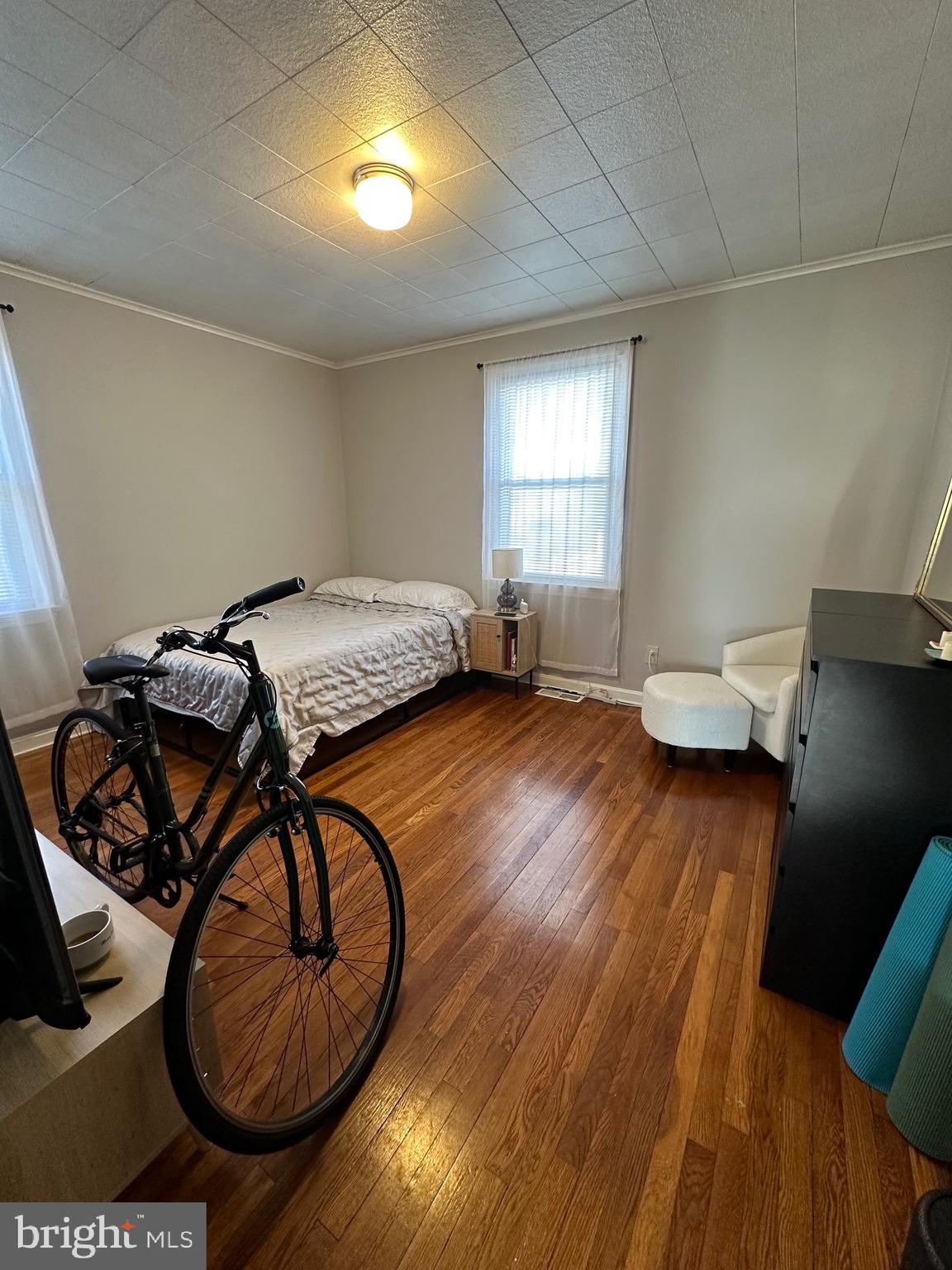 221 West Chester Pike, Unit B Ridley Park, PA 19078 - Photo 10 of 18 a bedroom with furniture and a window