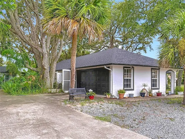 a view of a pathway both side of yard