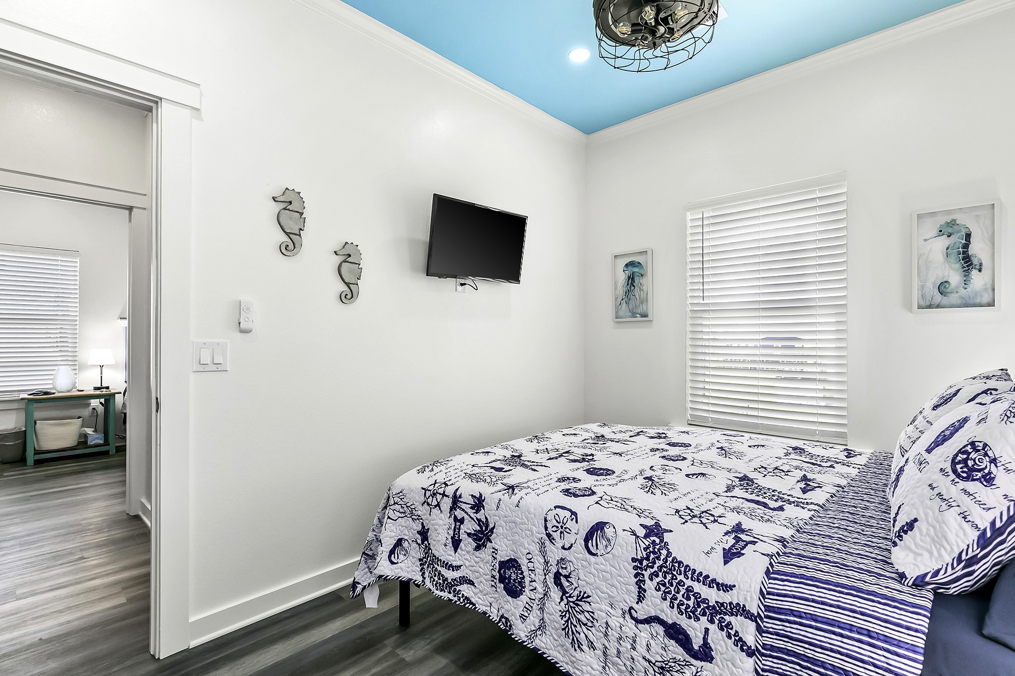 1014 Fort Velasco Drive Surfside Beach, TX 77541 - Photo 14 of 26 a bedroom with a bed and a window