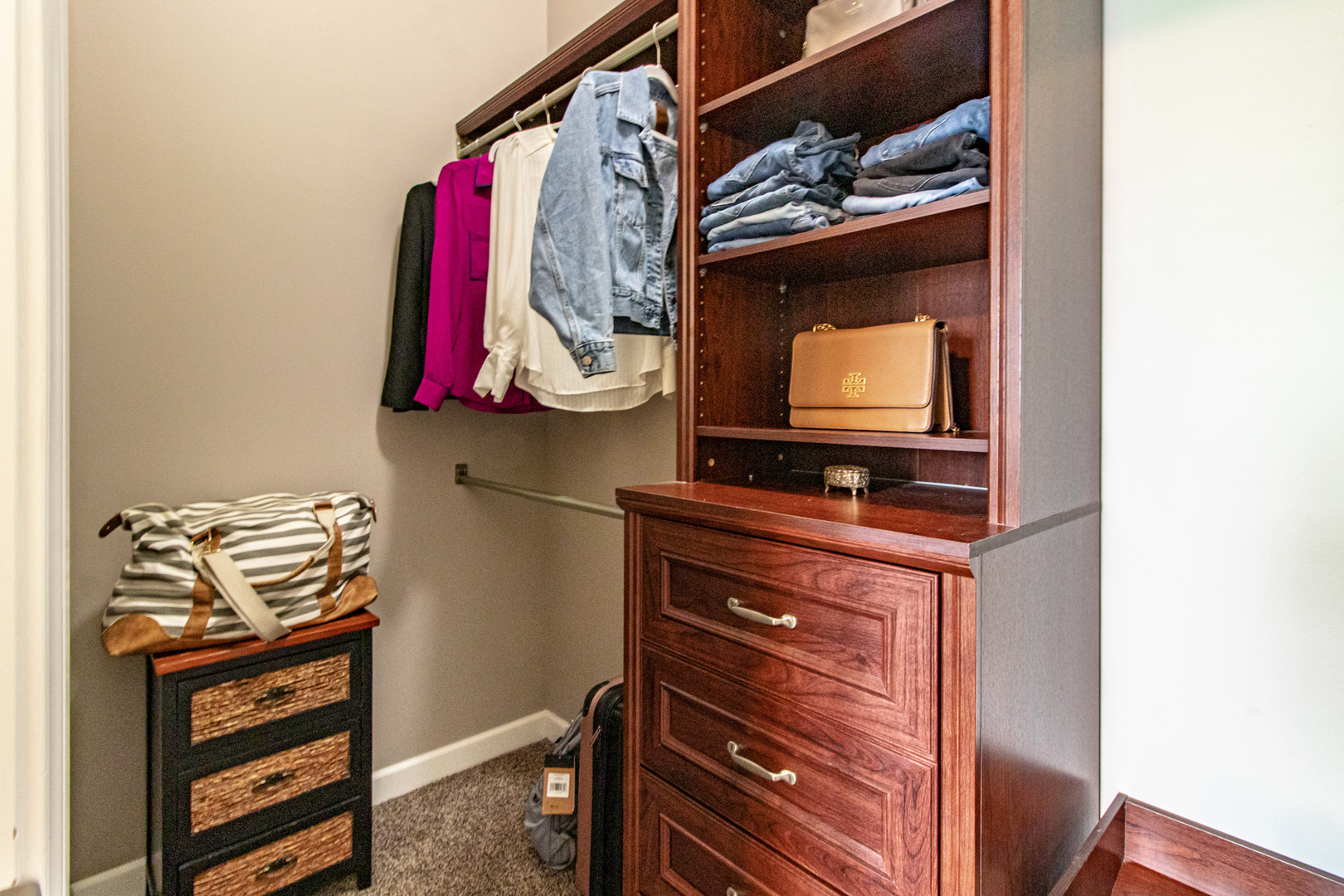 48 Northfield Terrace Wheeling, IL 60090 - Photo 20 of 36 a view of walk in closet with clothes and shoes