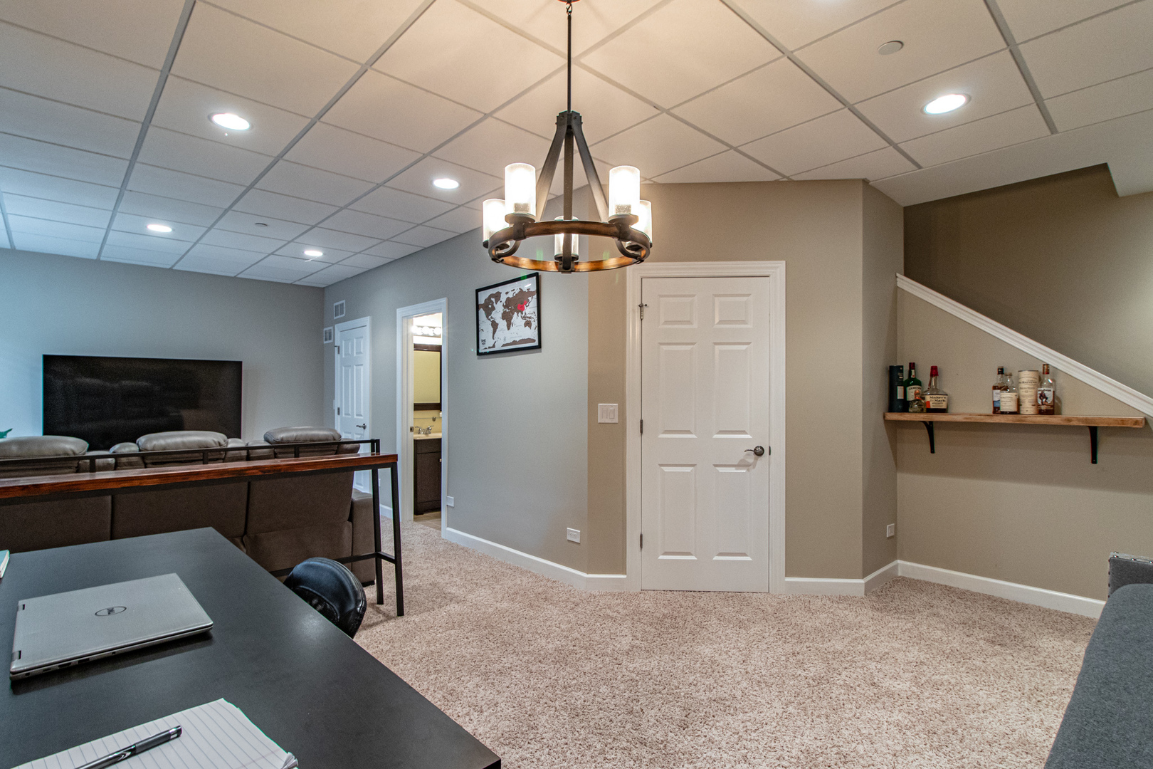 48 Northfield Terrace Wheeling, IL 60090 - Photo 29 of 36 a view of a livingroom with furniture and a flat screen tv
