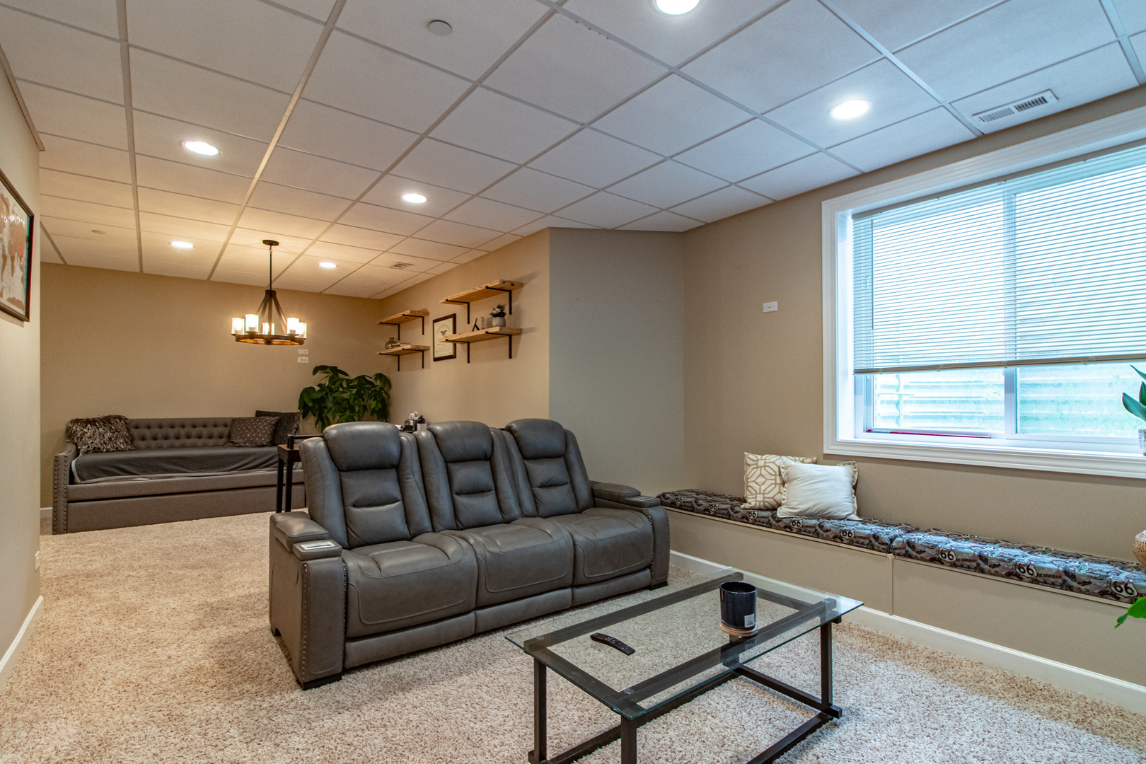 48 Northfield Terrace Wheeling, IL 60090 - Photo 32 of 36 a living room with furniture and a large window