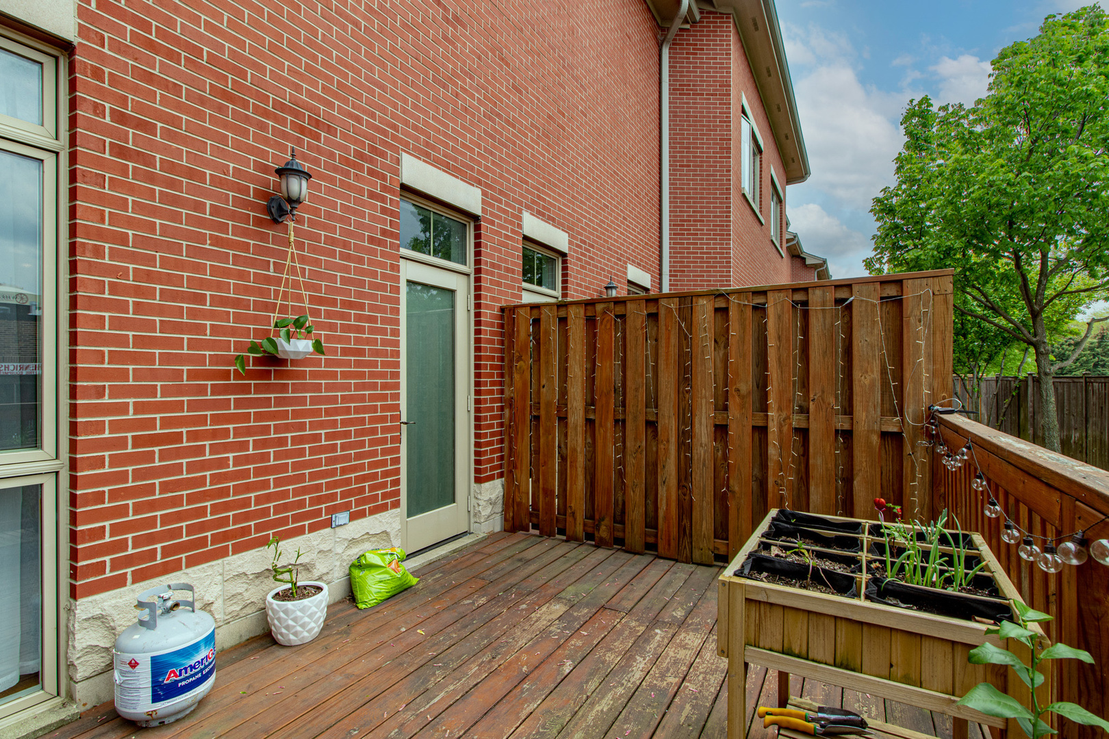 48 Northfield Terrace Wheeling, IL 60090 - Photo 35 of 36 a view of a balcony with potted plants