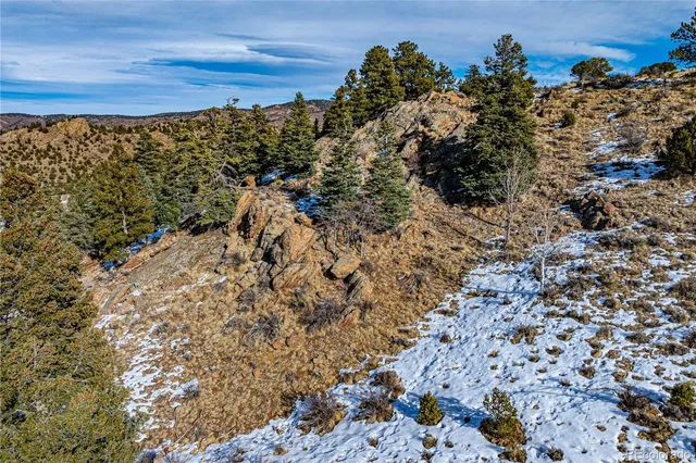 a view of a large building with a mountain view