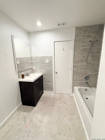 a view of empty room with windows