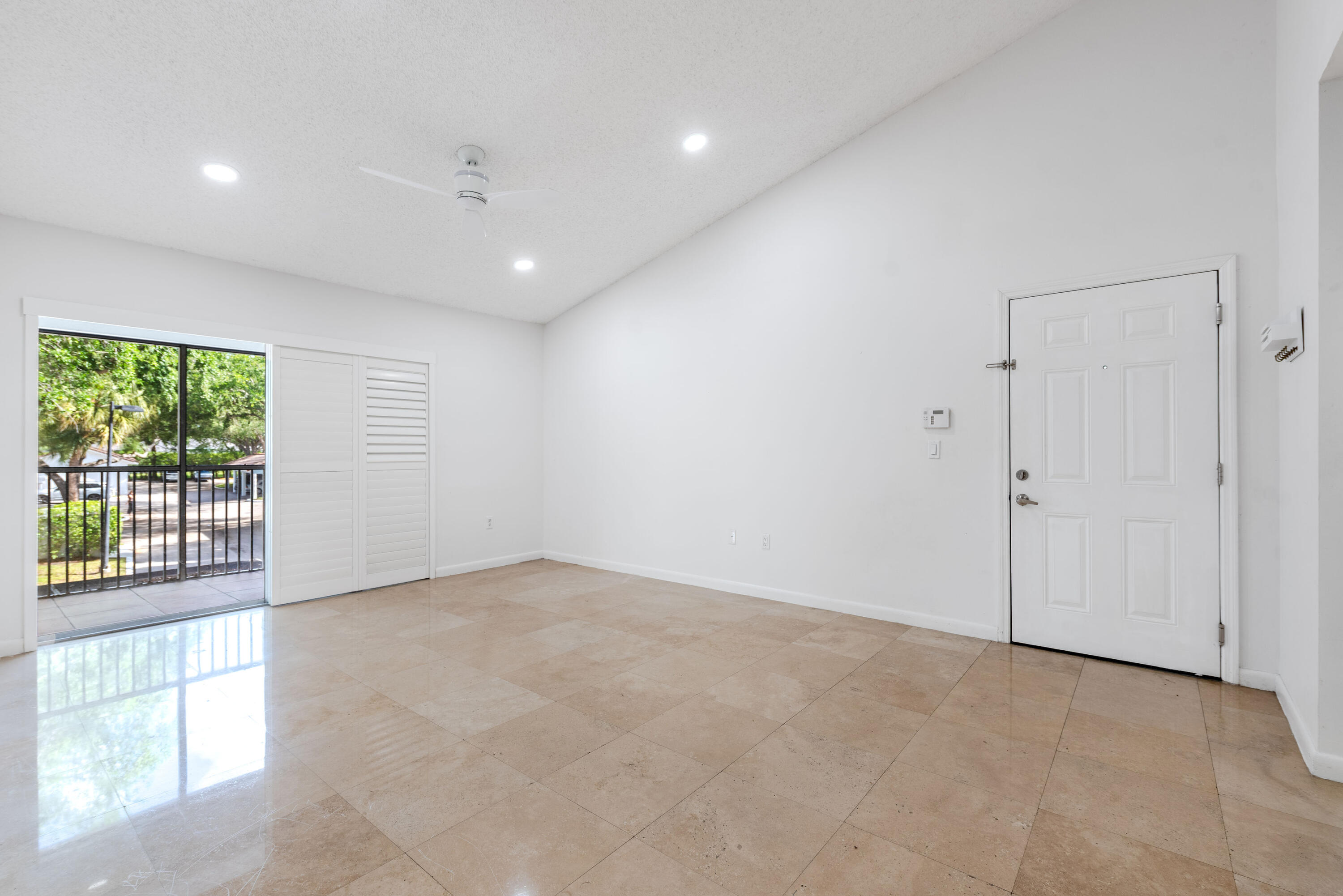 3153 Clint Moore Road, Unit 201 Boca Raton, FL 33496 - Photo 6 of 41 Living Room/w plantation shutters
