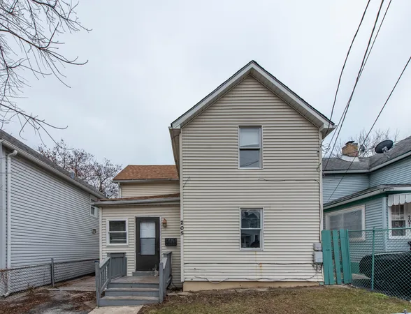 a view of house that has a window on the house