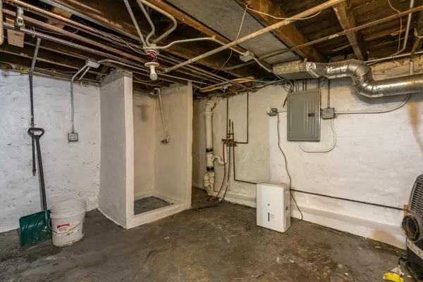 a view of a room with wooden walls