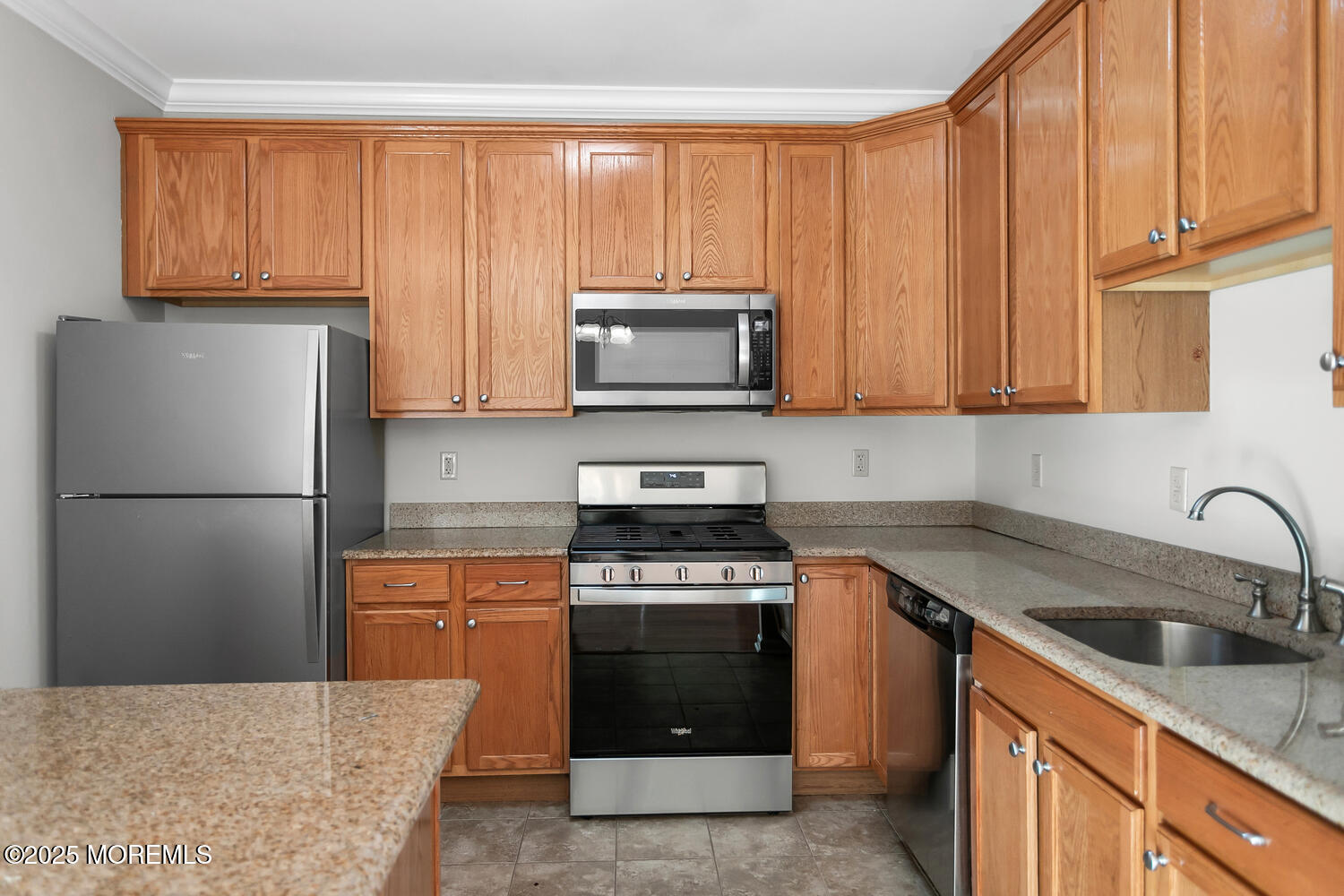 325 Regency Place Woodbridge, NJ 07095 - Photo 13 of 37 a kitchen with a sink stove and refrigerator