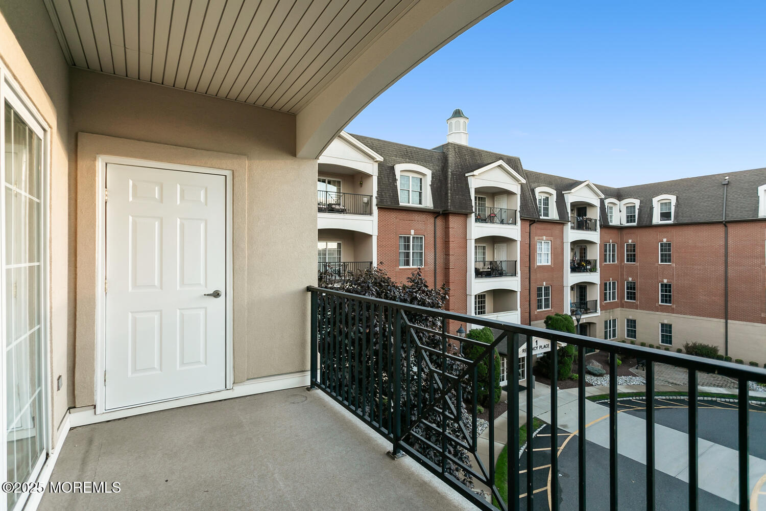 325 Regency Place Woodbridge, NJ 07095 - Photo 28 of 37 a view of a building from a balcony