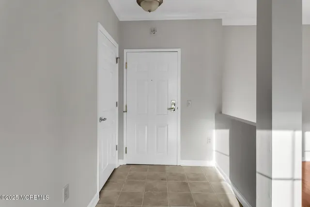a view of a hallway and closet