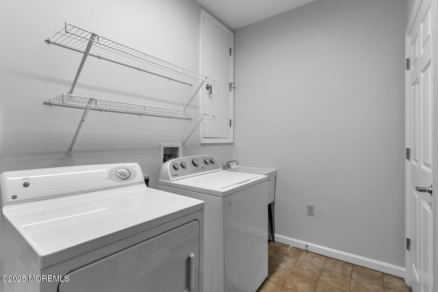 325 Regency Place Woodbridge, NJ 07095 - Photo 32 of 37 a utility room with dryer and washer