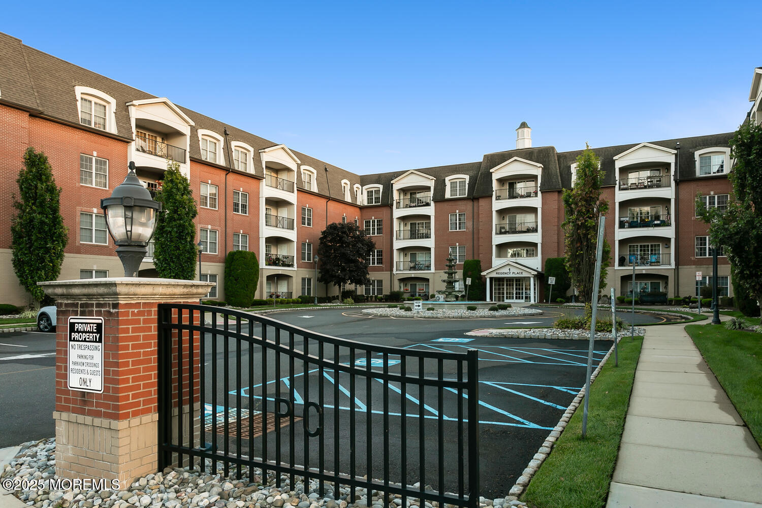 325 Regency Place Woodbridge, NJ 07095 - Photo 35 of 37 a front view of a building with glass windows