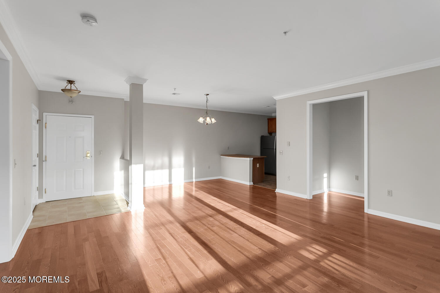 325 Regency Place Woodbridge, NJ 07095 - Photo 6 of 37 a view of gallery with wooden floor