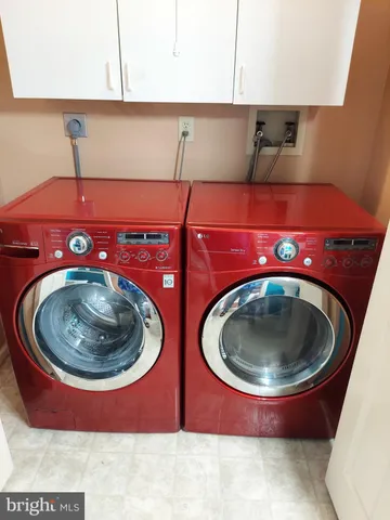 a kitchen with a stove and fan