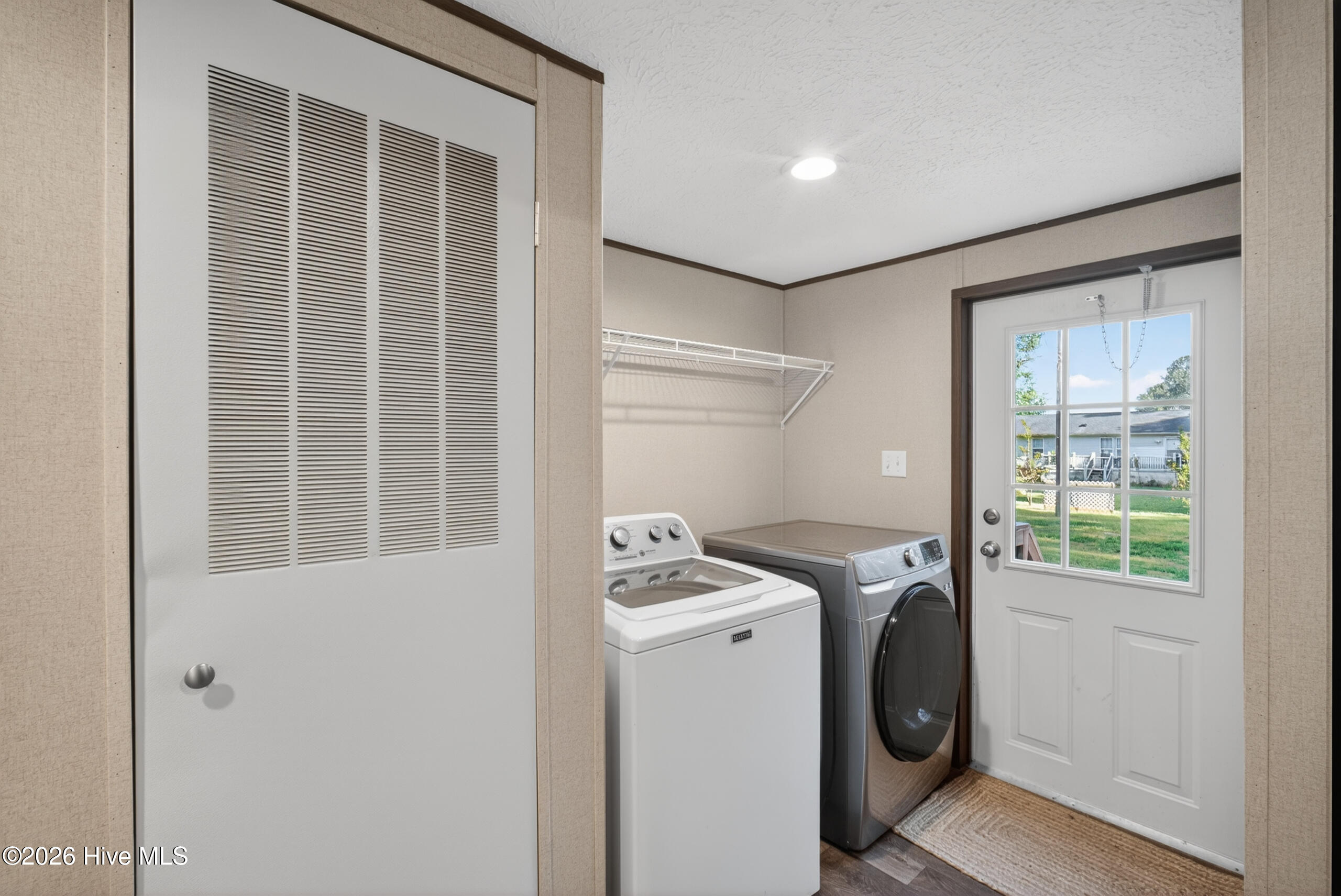 123 Seabreeze Road Hertford, NC 27944 - Photo 9 of 22 LAUNDRY ROOM AND REAR ENTRANCE
