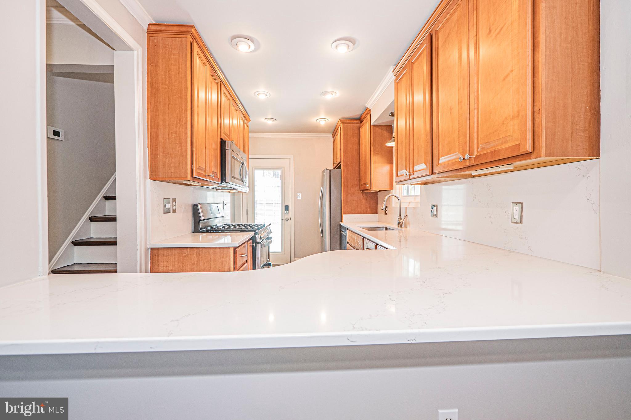 103 Nursery Road Linthicum Heights, MD 21090 - Photo 17 of 60 Main Level - Kitchen w/ Breakfast Bar