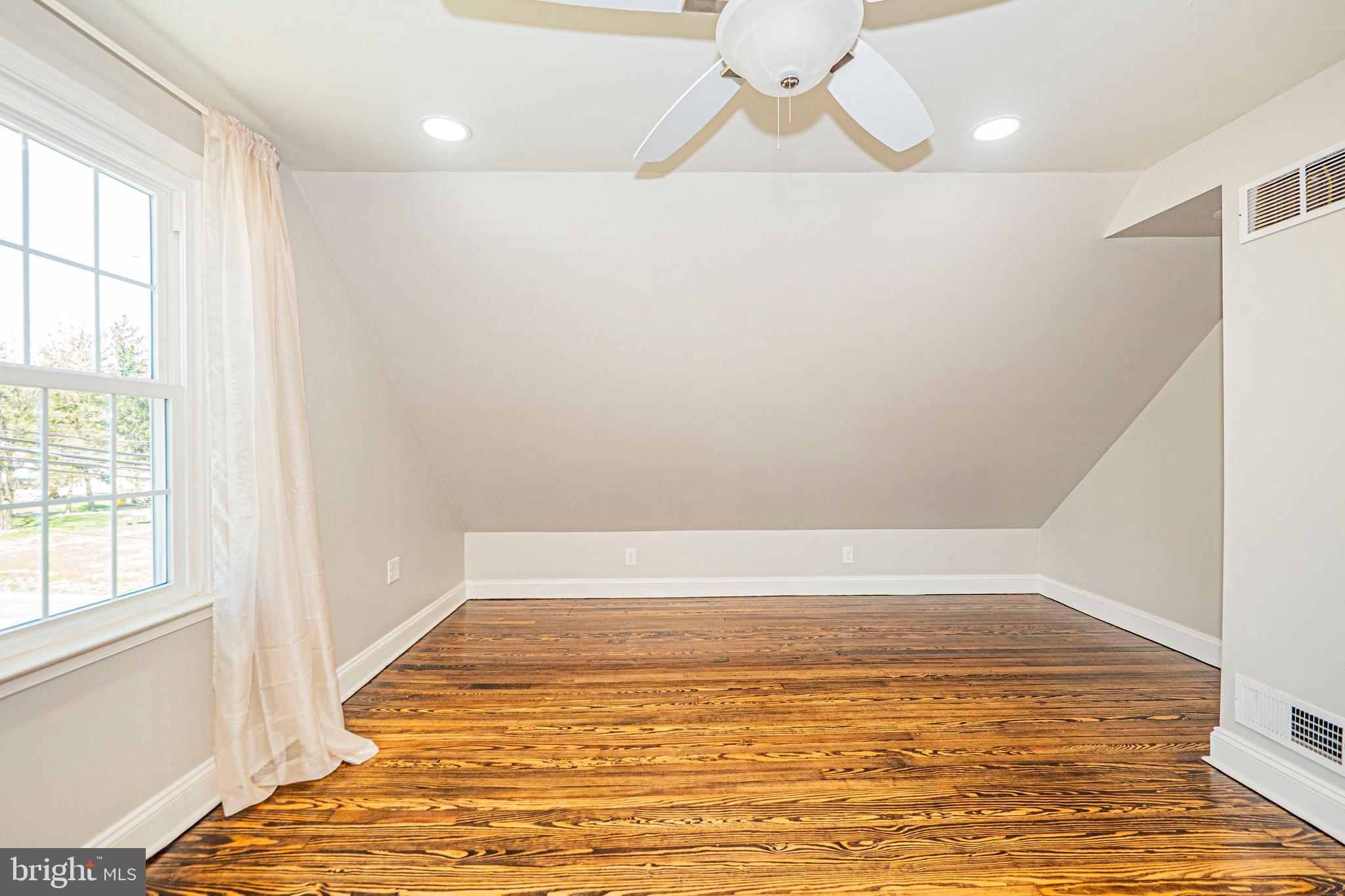 103 Nursery Road Linthicum Heights, MD 21090 - Photo 36 of 60 Upper Level - Third Bedroom w/ Sloped Ceilings